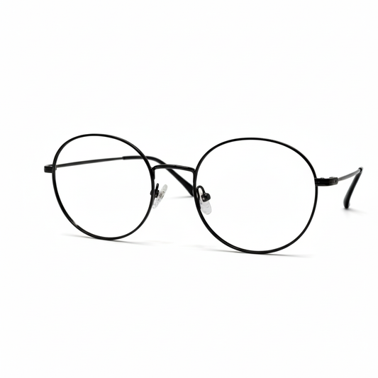 Óculos redondo grafite unissex com armação em metal leve e resistente. Imagem destacando o design moderno e as lentes transparentes, compatíveis com diferentes graus e tratamentos.